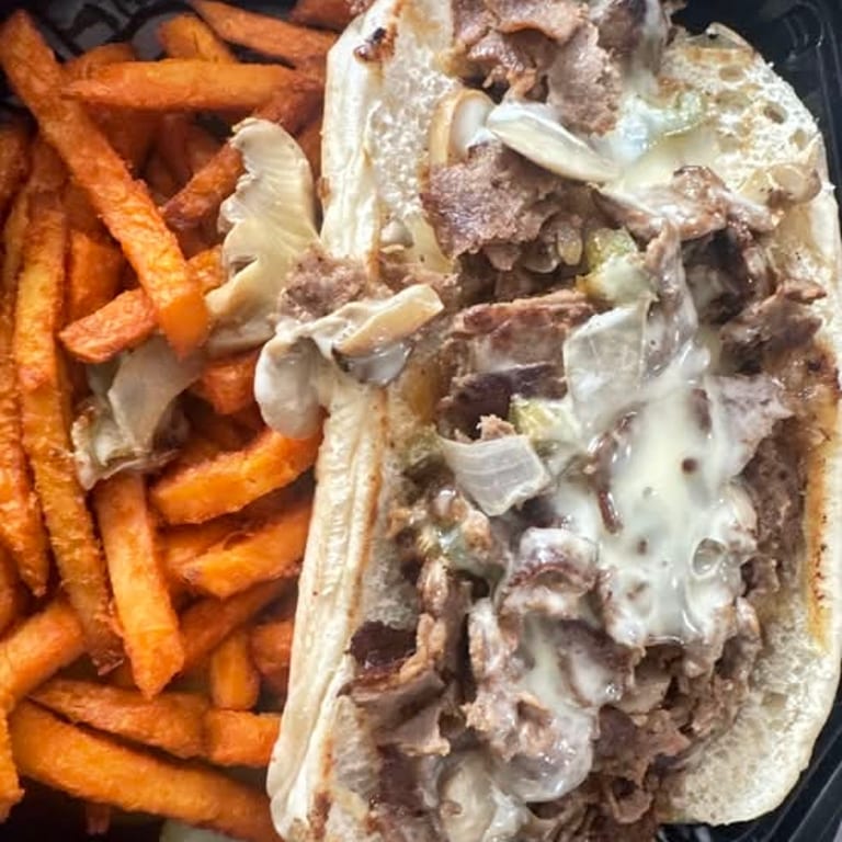 Indulge in Our Cheesesteak